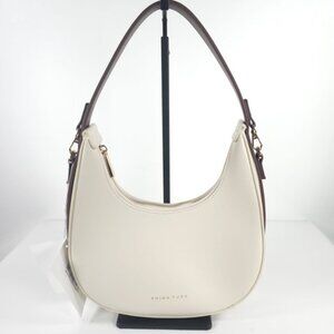 NWT TRINA TURK LEATHER OFF WHT / BROWN CRESCENT HOBO HANDBAG